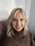 Christine M. Genda