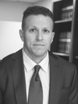 Gregory D. Huffman