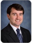Adam L. White