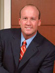 Andrew J Merken