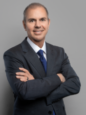 Angel L. Reyes III headshot