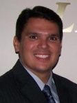 Carlos Hughes Jr.