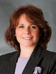 Christa A. Arcos