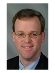 Christopher J Caslin