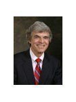 Christopher A. Hughes