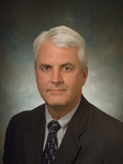 Christopher J. Micklatcher