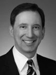 Dennis L James