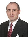 Erik T Koons