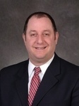 Erik J Winton