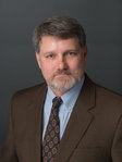 Erik R. Wollam headshot