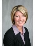 Jami E. Leach