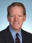 John K Veroneau