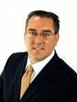 Justin Allen Coquat headshot