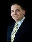 Justin Glen Manchester headshot