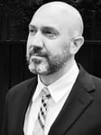 Komron Jon Maknoon headshot