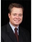 Mark E. Dykes