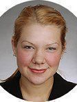 Nicole M Crum