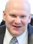 Paul D Benson