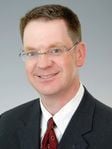 Stephen J Curley