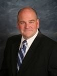 Thomas J. Adams