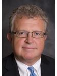 Timothy E. Huffman