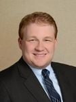 Travis James Cox headshot
