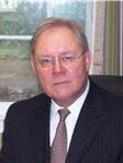 William E. Brewer