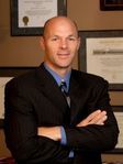 Christopher J Zachar