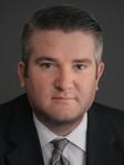 Garrett J. Tuck