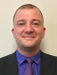 John E. Schlosser