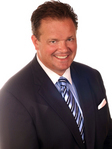 Mark L. Stevens